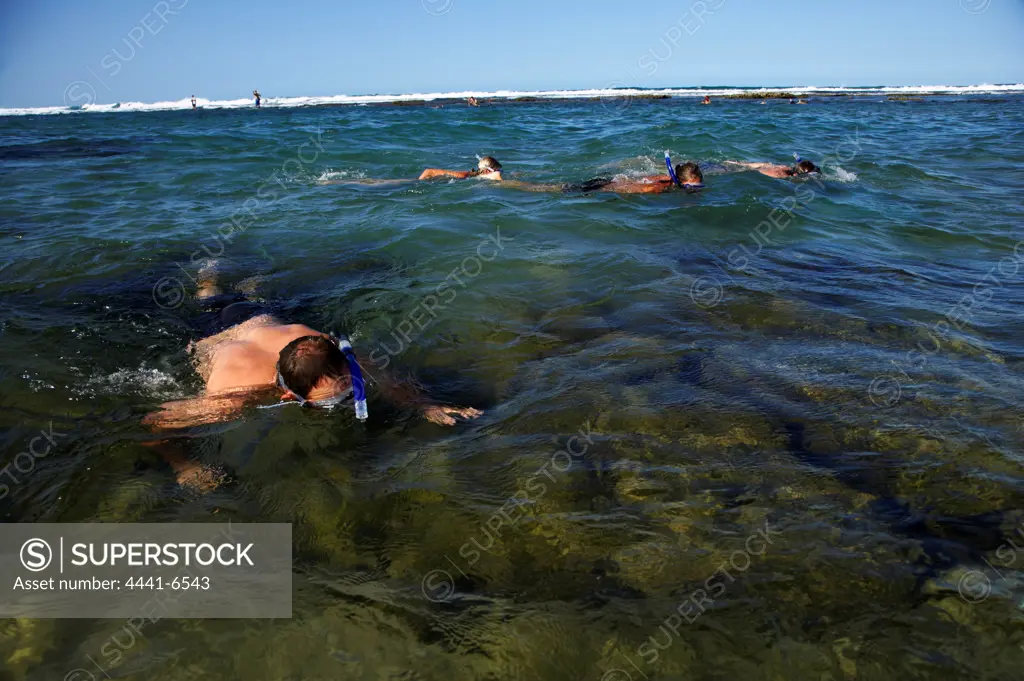 Tourists on beach. Cape Vidal. Greater St Lucia Wetland Park. KwaZulu Natal. South Africa