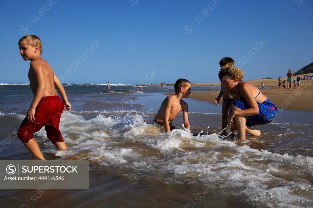 Tourists on beach. Cape Vidal. Greater St Lucia Wetland Park. KwaZulu Natal. South Africa