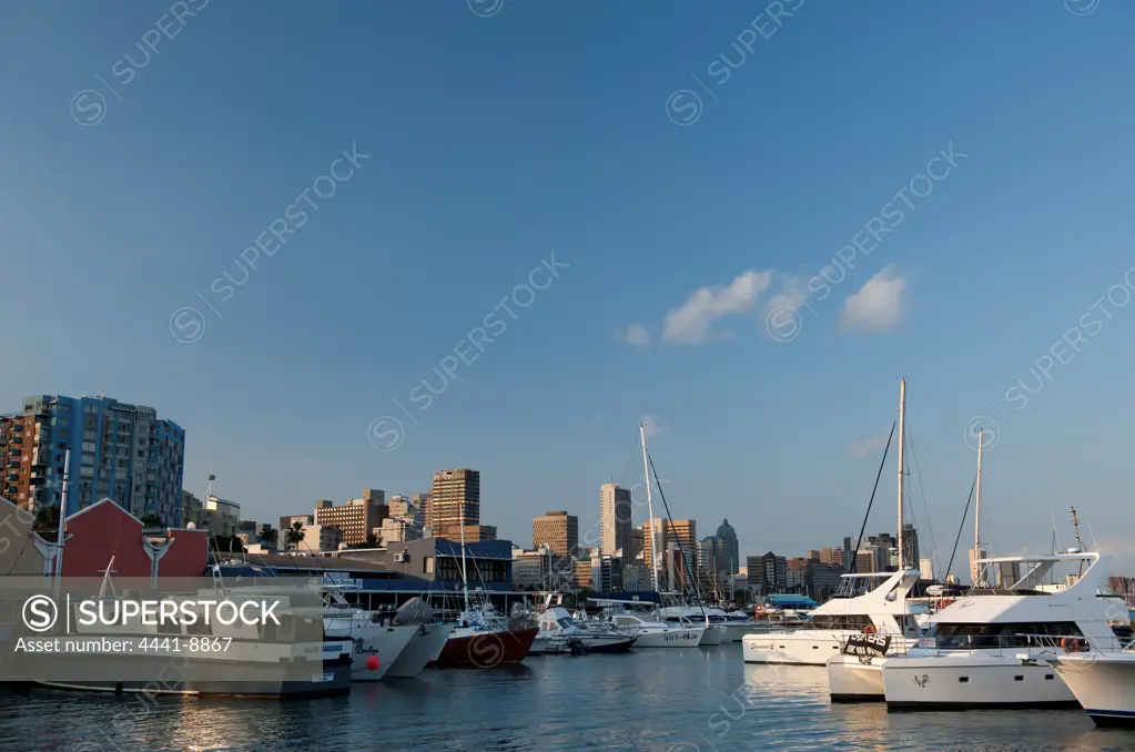 City skyline and small craft harbour from Wilson's (Wilsons) Wharf at the harbour. Durban. KwaZulu Natal. South Africa.