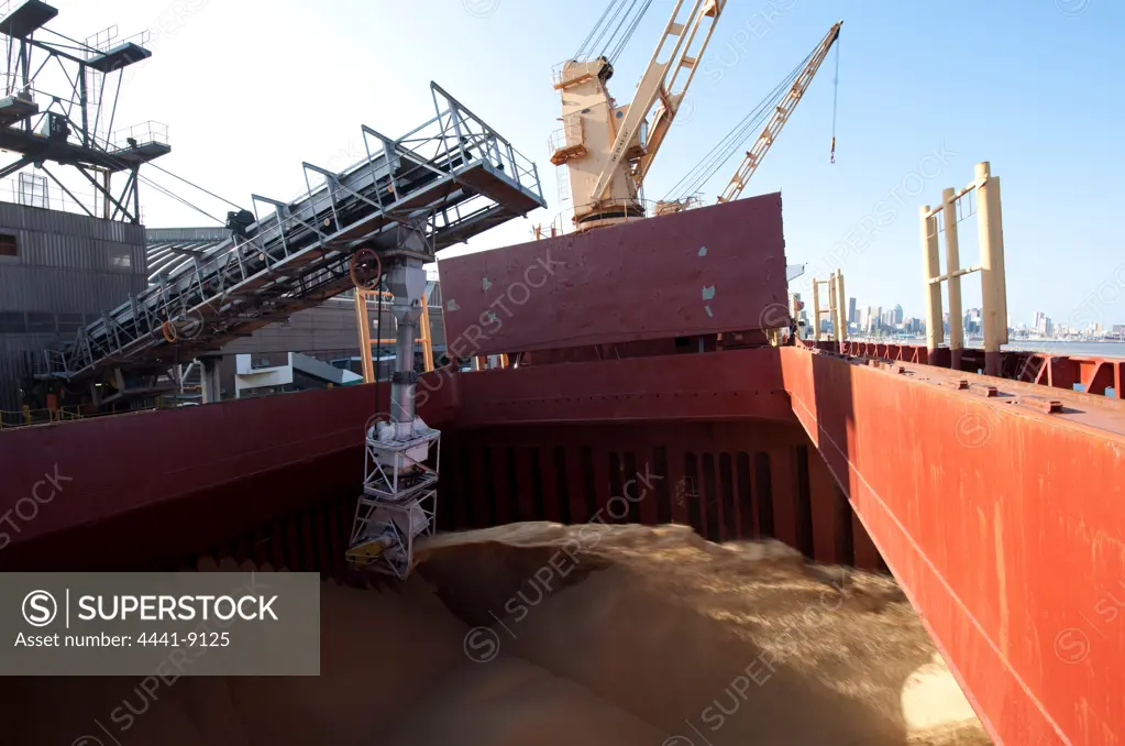 Loading sugar onto a ship from the Sugar Terminal at Maydon Wharfat the harbour. Durban. KwaZulu Natal. South Africa.