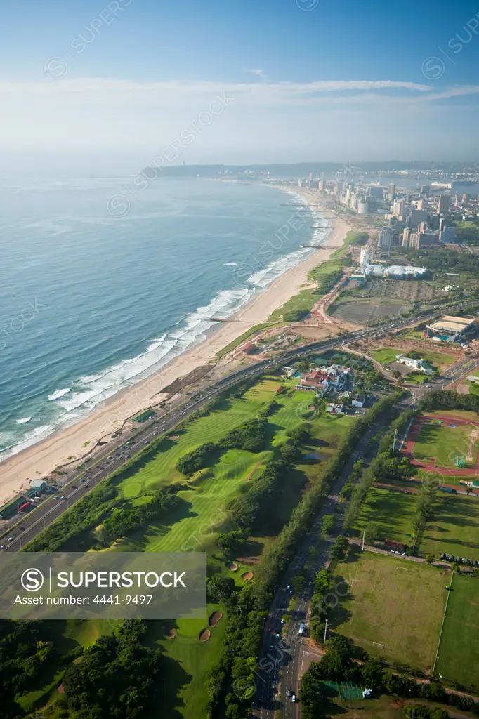 Aerial view of Durban from above the Durban Country Club showing The Moses Mabhida Stadium and city in the backgroundKwaZulu Natal. South Africa.
