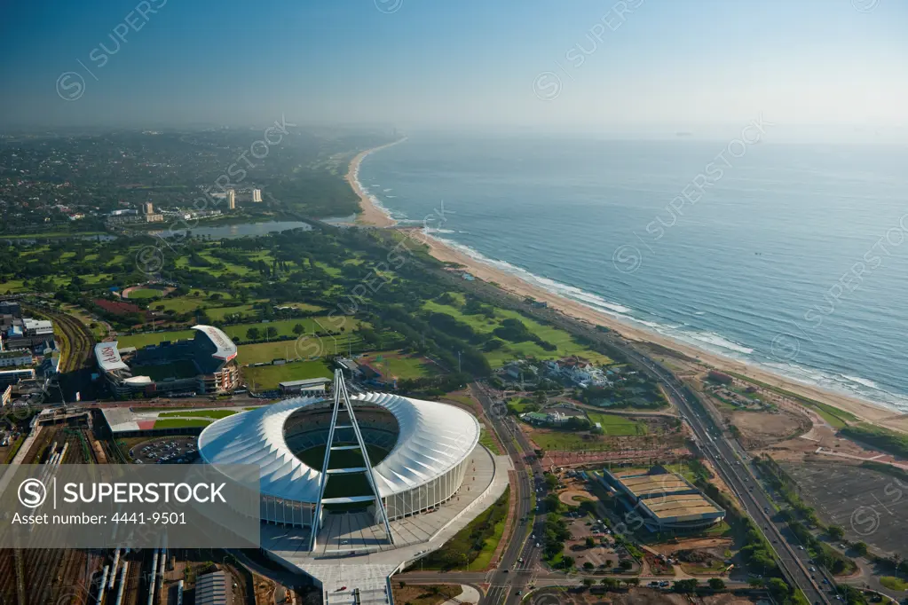 Aerial view of Durban showing The Moses Mabhida and ABSA Stadiums and the Umgeni River and Umhlanga in the Background. KwaZulu Natal. South Africa.