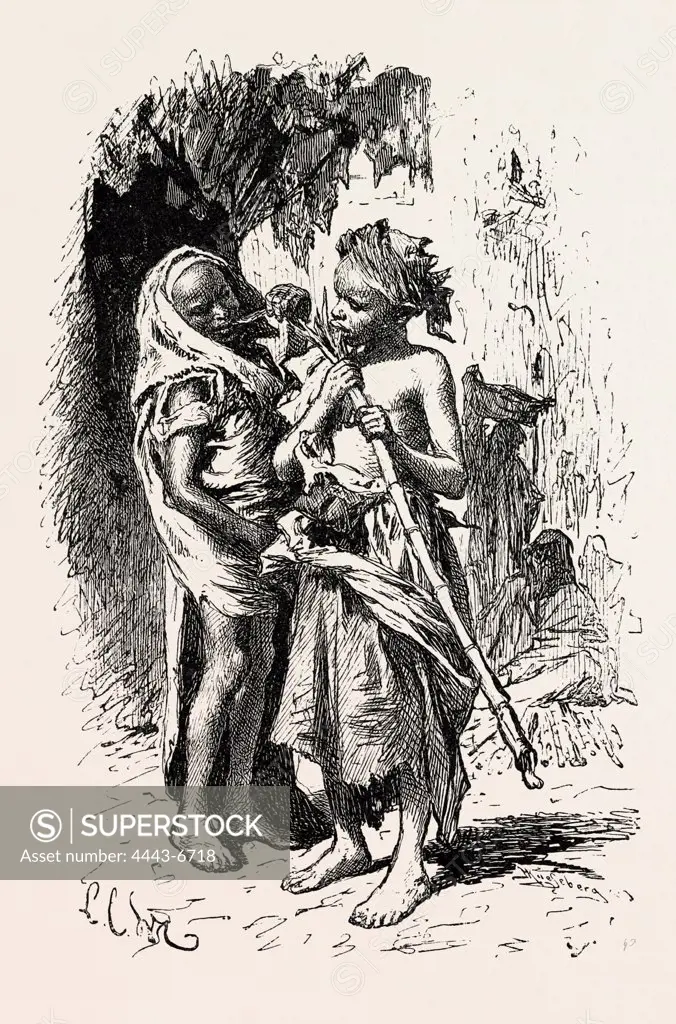 Egyption boys sugar-stick.  Egypt, engraving 1879