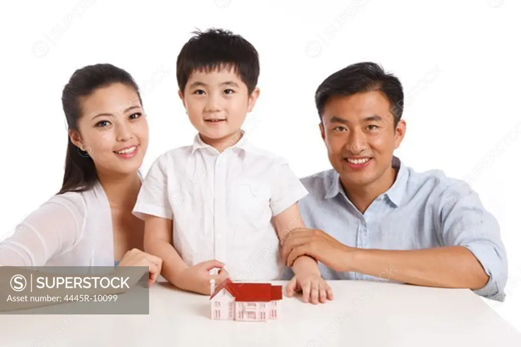 Family with house model