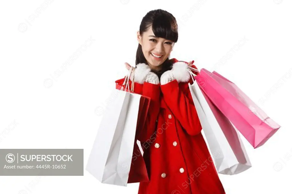 Young woman holding shopping bag