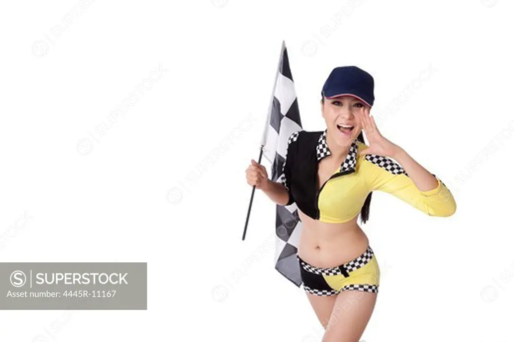 Young woman holding checkered flag