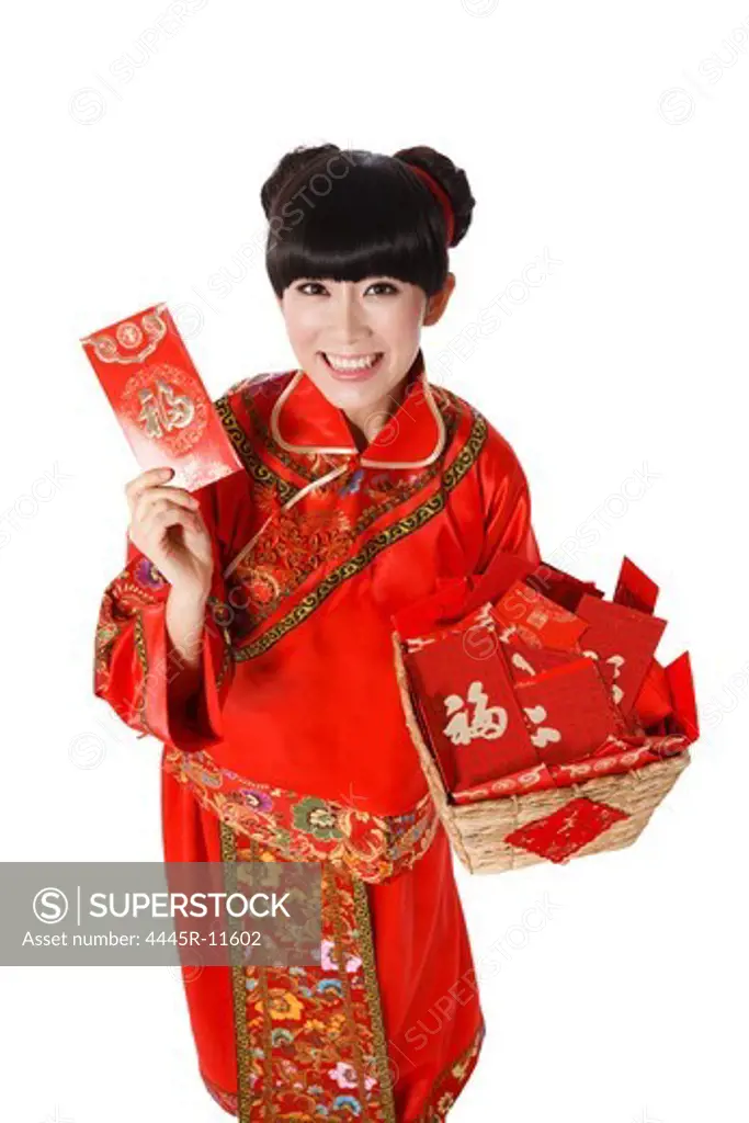 Young woman holding red envelopes