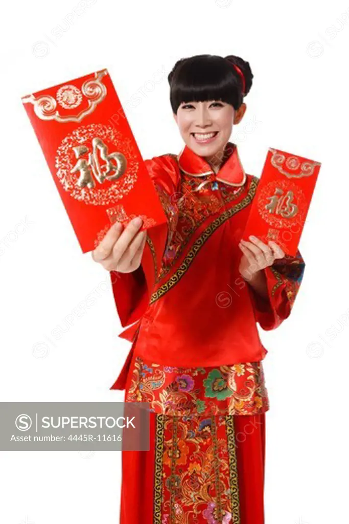 Young woman holding red envelopes