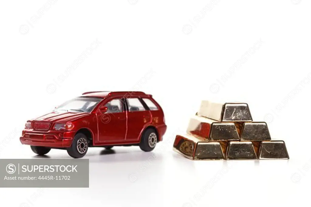 Car model and gold bars