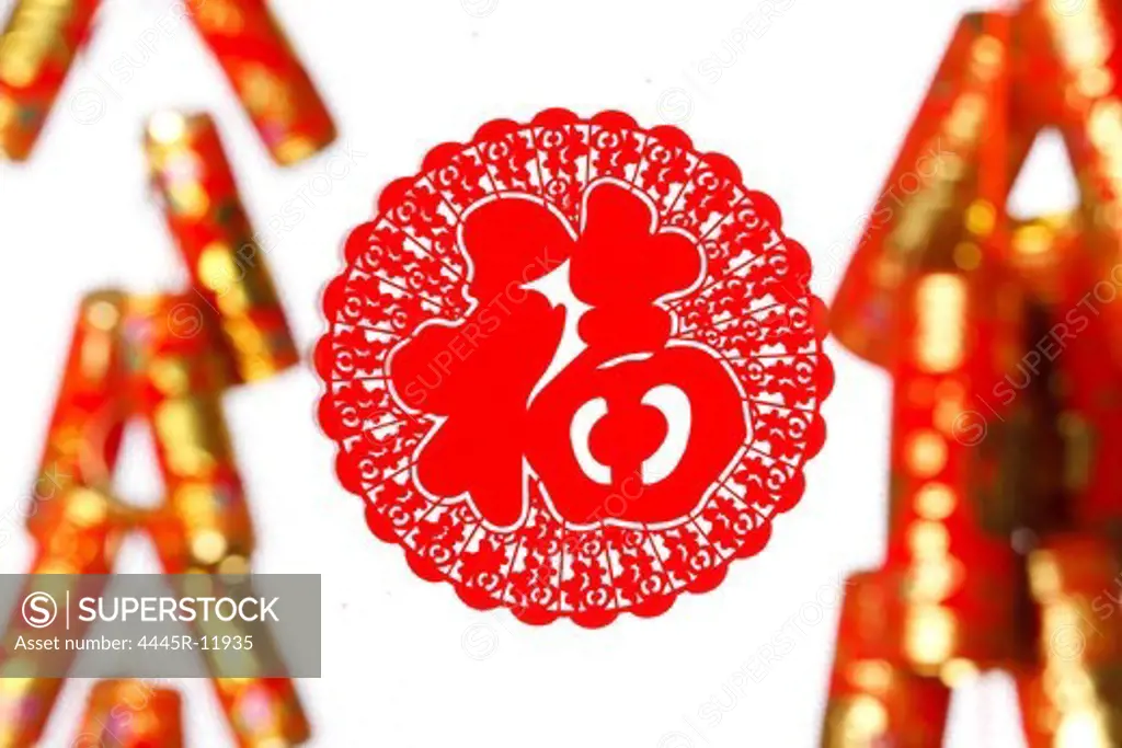 Close-up of paper cut-out and firecrackers