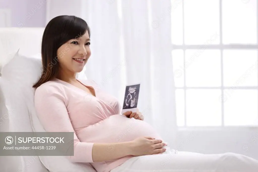 Pregnant woman with Sonogram