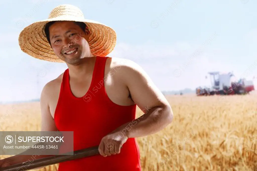 Farmer in wheat field