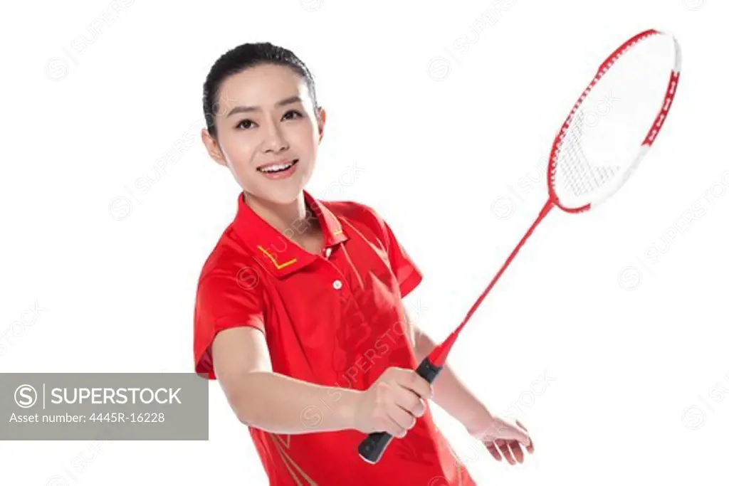 Female athletes playing badminton