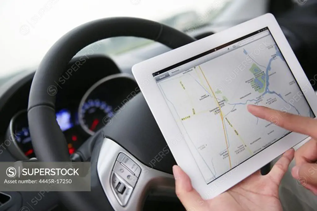 Young people use car navigation systems
