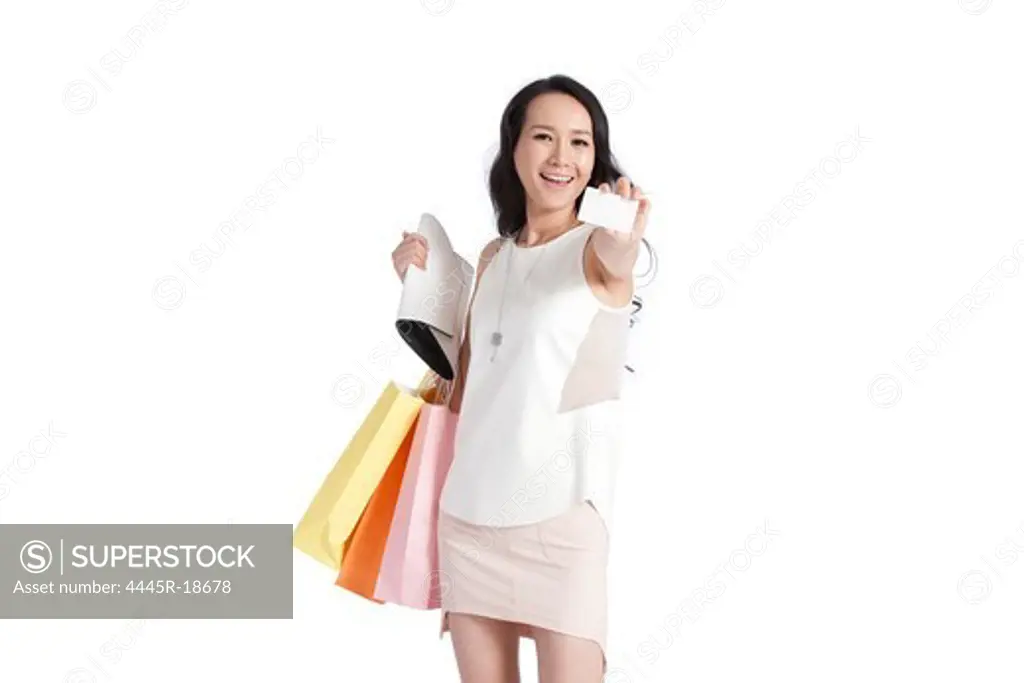 Happy young female white-collar shopping