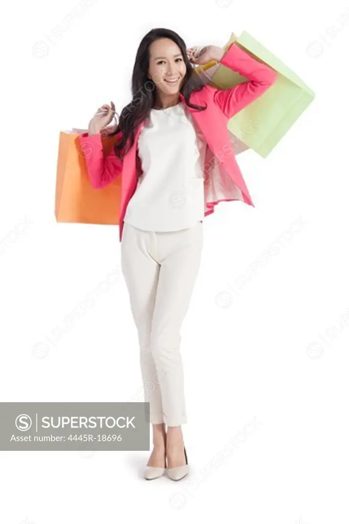 Happy young female white-collar shopping
