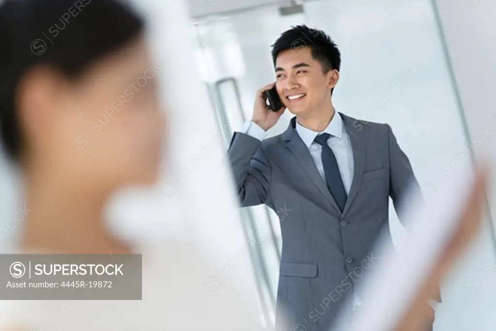 Young business man calling