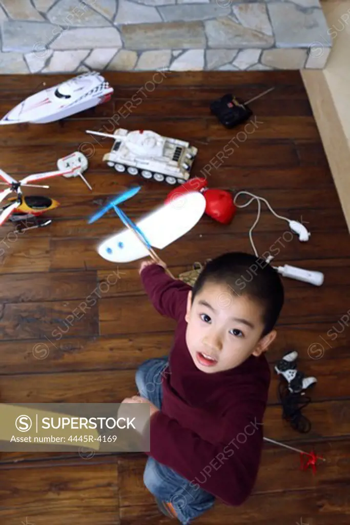 6-7 year old boy playing at home
