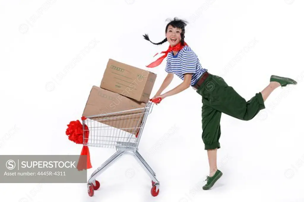 Young woman with shopping cart