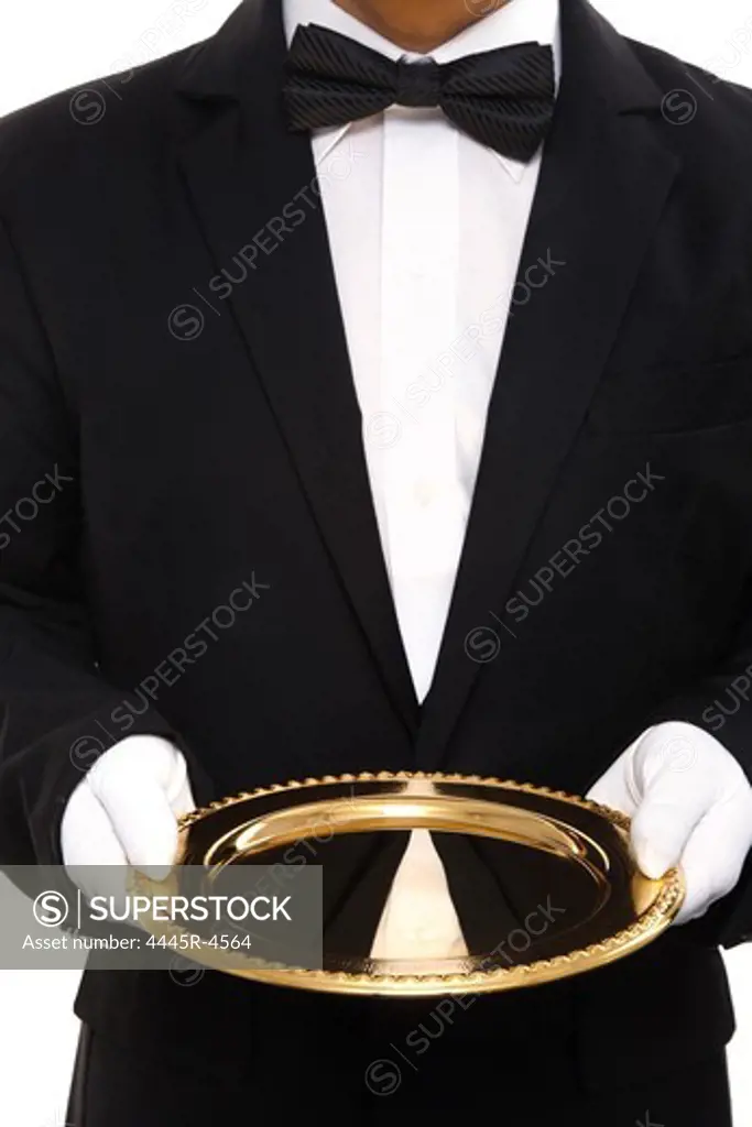 Waiter carrying gold tray