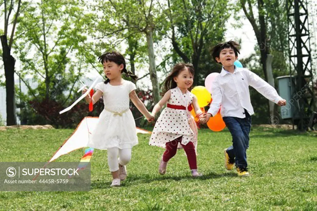 Oriental children playing outdoors
