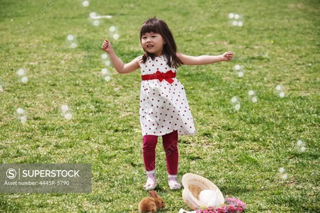 A girl playing outside