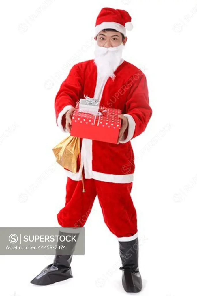 Portrait of young man in Santa costume