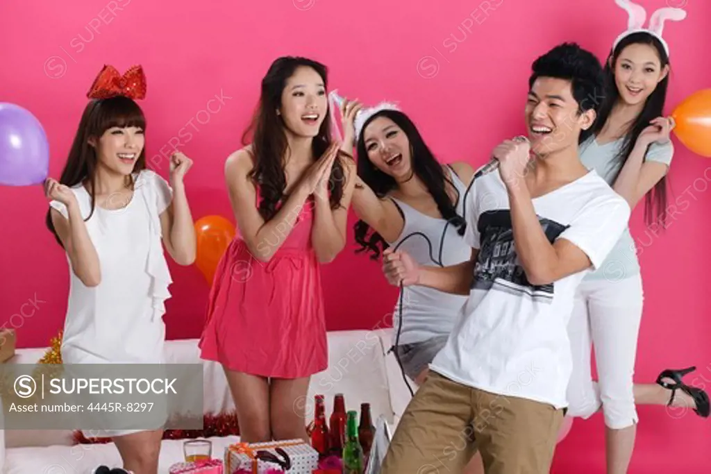 Group of young people at party
