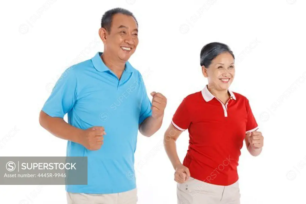 Senior couple running