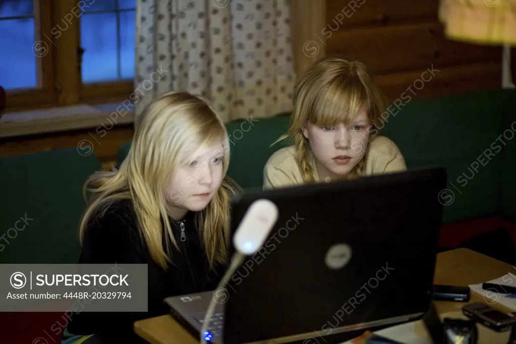 Girls by the computer