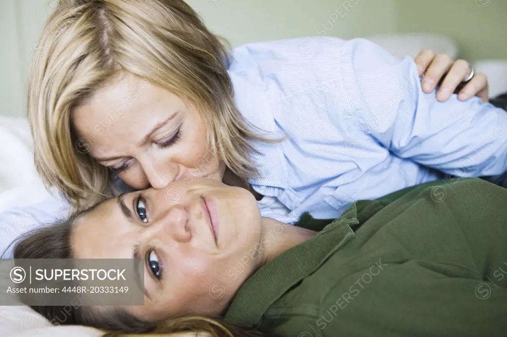 Girls in love in bed
