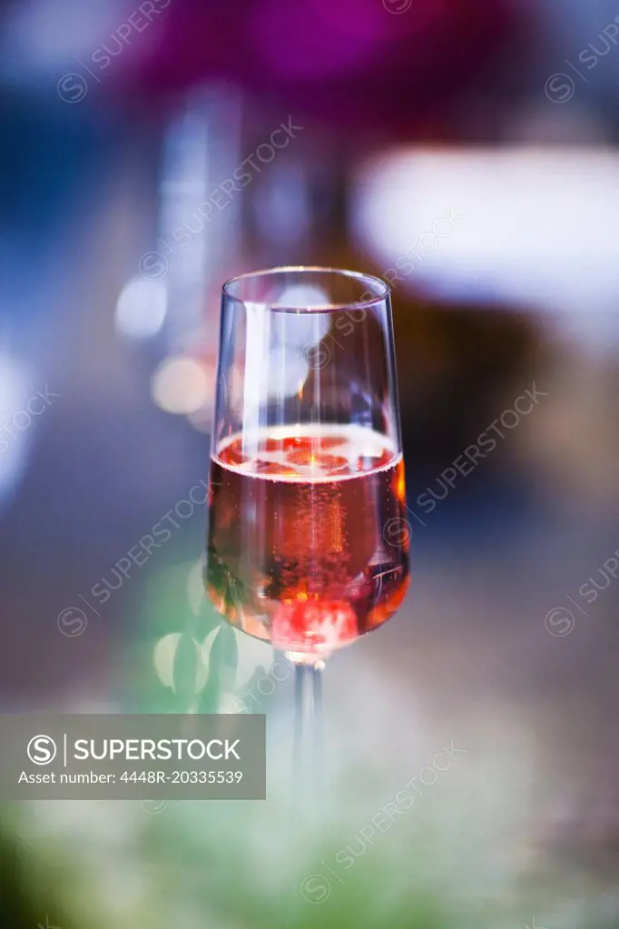 Half-filld glas with drink