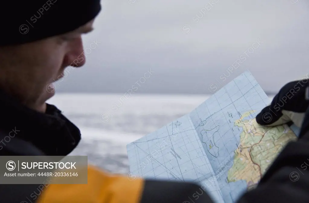 Man looking at map