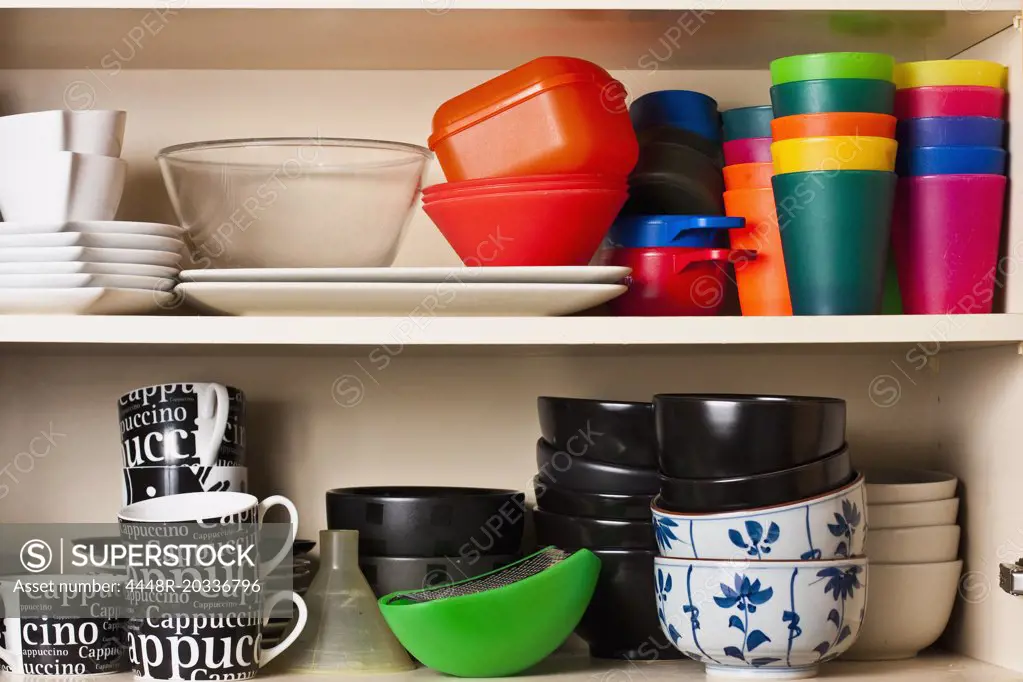 Cups and bowls on shelf