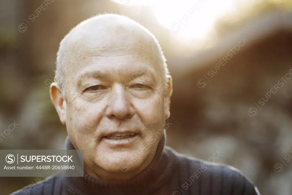 Portrait of senior gay man outdoors