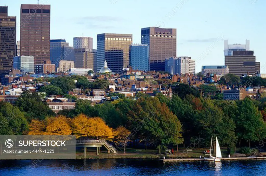 Sailing boat on Charles River in front of high rise buildings, Boston, Massachusetts, USA, America