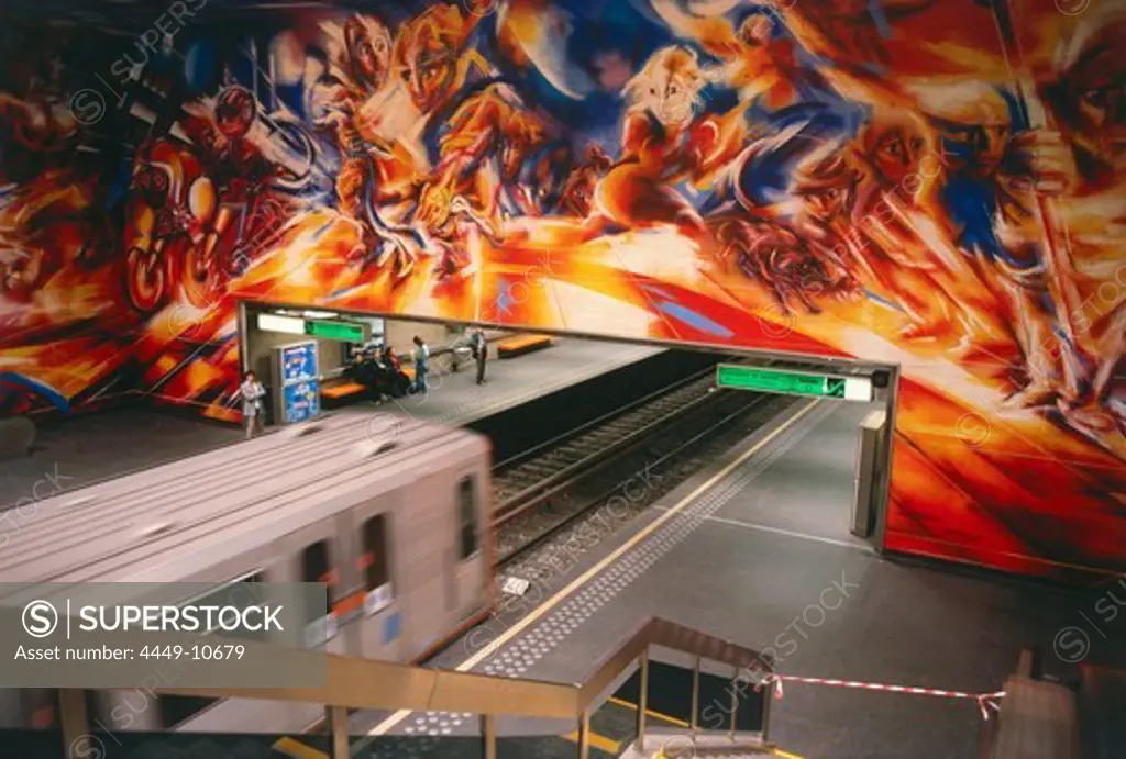 Extensive painting on a wall at a subway station, Brussels, Belgium