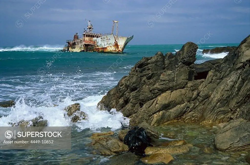 Shipwreck in front of coast, Cape Algulhas, West Cape, South Africa