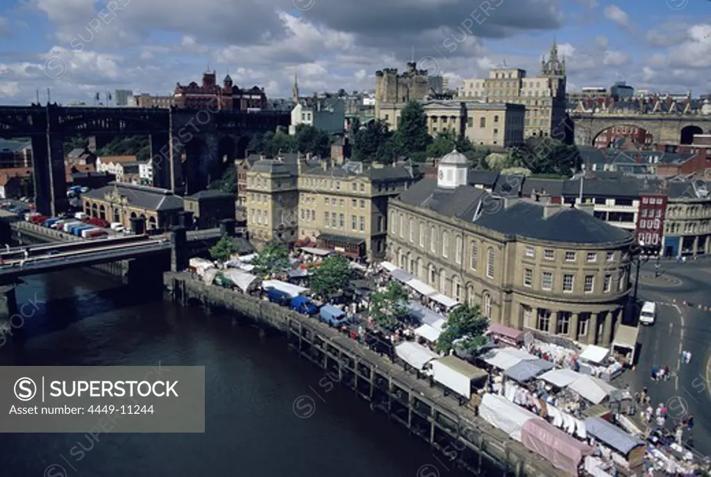 Aerial view over the River Tyne and Newcastle upon Tyne during Saturday market, Northumberland, England