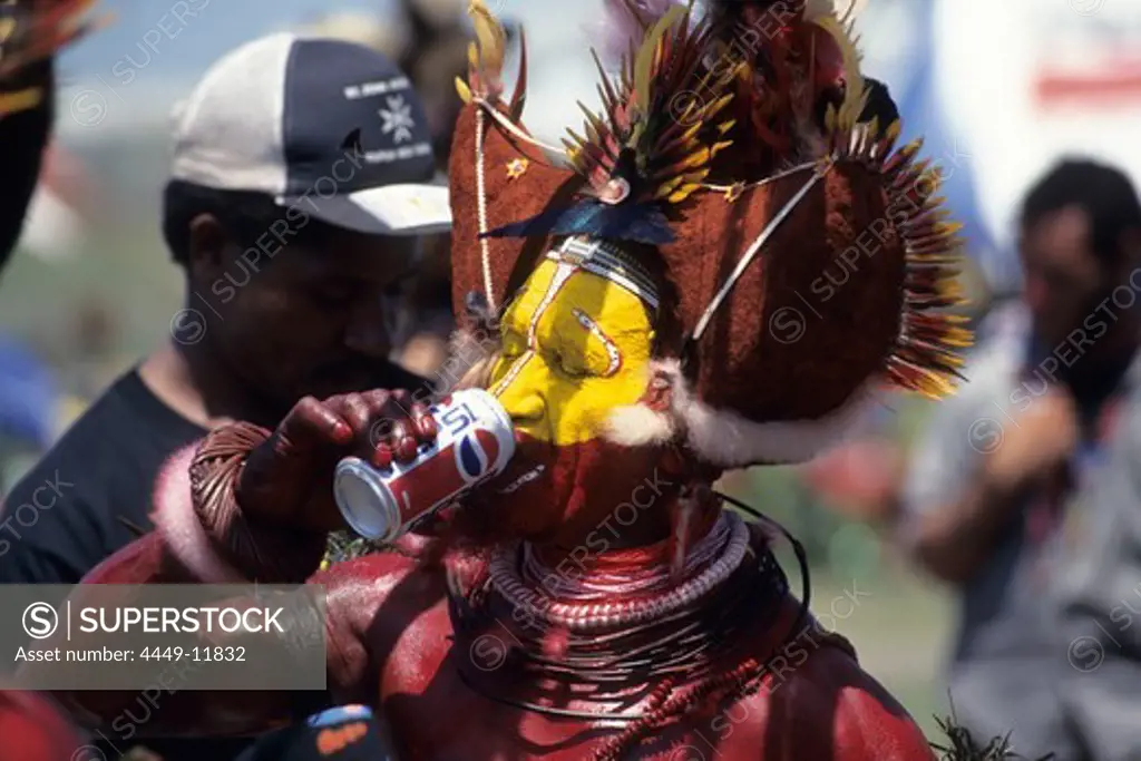 Papua New Guinean Huli Drinking Pepsi, Port Moresby Cultural Festival, Port Moresby, Papua New Guinea