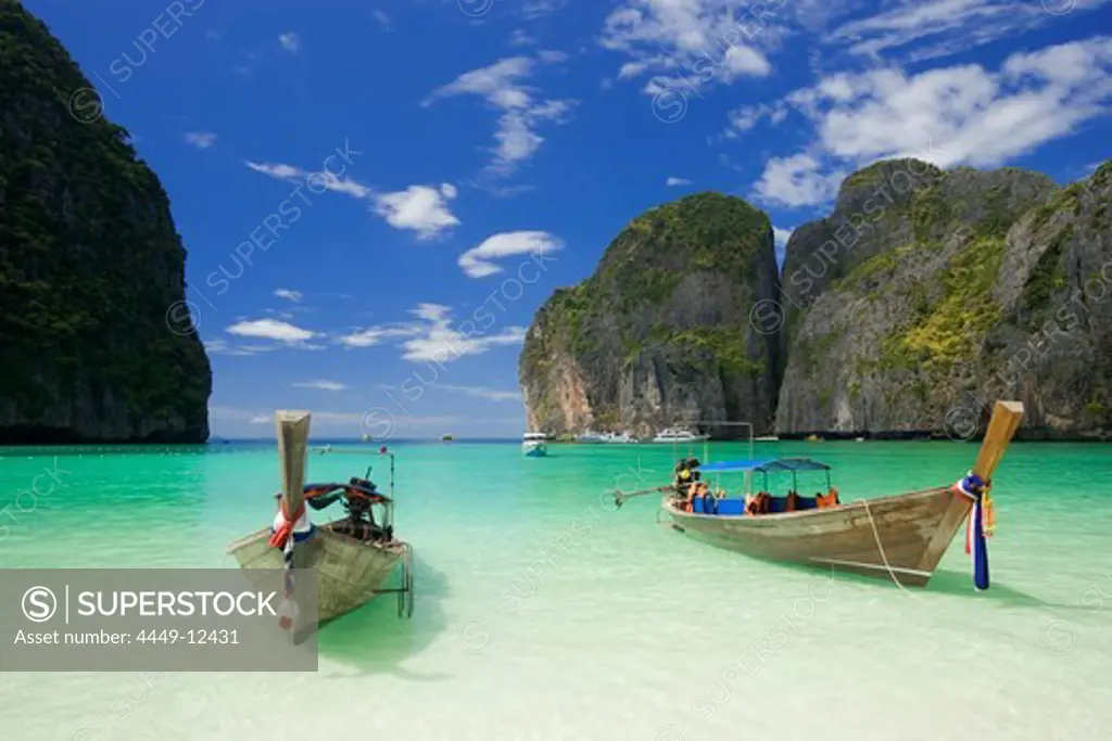 Two boats anchoring in the Maya Bay, a beautiful scenic lagoon, famous for the Hollywood film ""The Beach"", Ko Phi-Phi Leh, Ko Phi-Phi Islands, Krabi, Thailand, after the tsunami