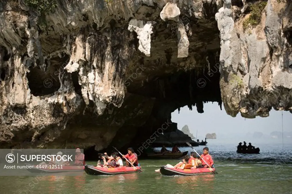 Group of tourists kayaking, passing a Karst formation, Phang-Nga Bay, Ao Phang Nga Nation Park, Phang Nga, Thailand
