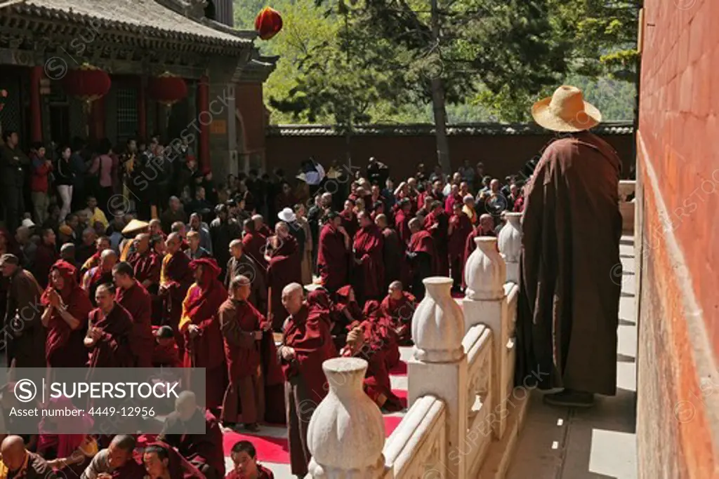 prayer ceremony, buddhist monks, court yard, during birthday of Wenshu, Xiantong Monastery, Wutai Shan, Five Terrace Mountain, Buddhist Centre, town of Taihuai, Shanxi province, China, Asia
