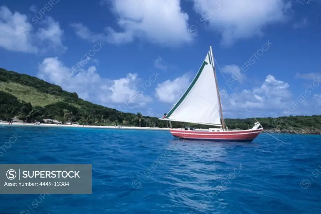 A red sailing boat, Tobago Cays, St. Vincent and The Grenadines, Carribean