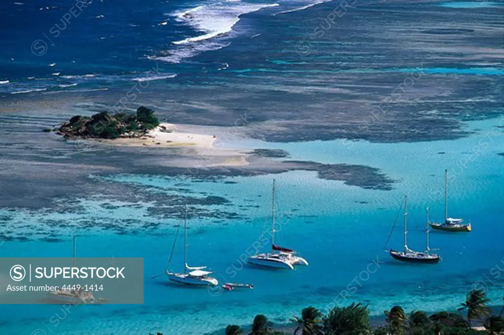 Aerial view of sailing boats off an uninhabited island, St. Vincent, Grenadines, Caribbean, America