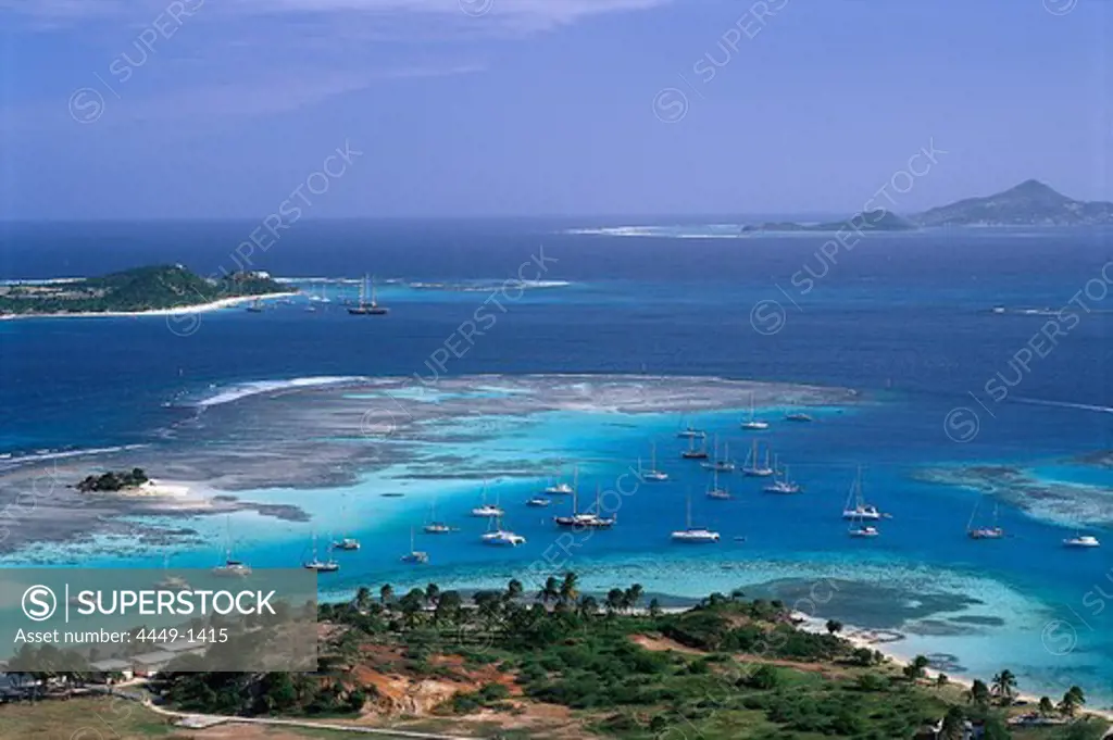 Aerial view of boats in a bay off Union Island, St. Vincent, Grenadines, Caribbean, America