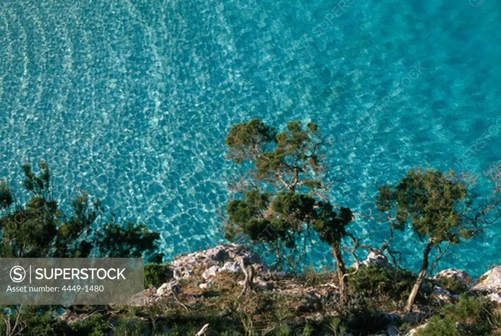 High angle view at steep coast and ocean in the sunlight, Cala S'Amonia, Santanyi, East coast, Majorca, Spain