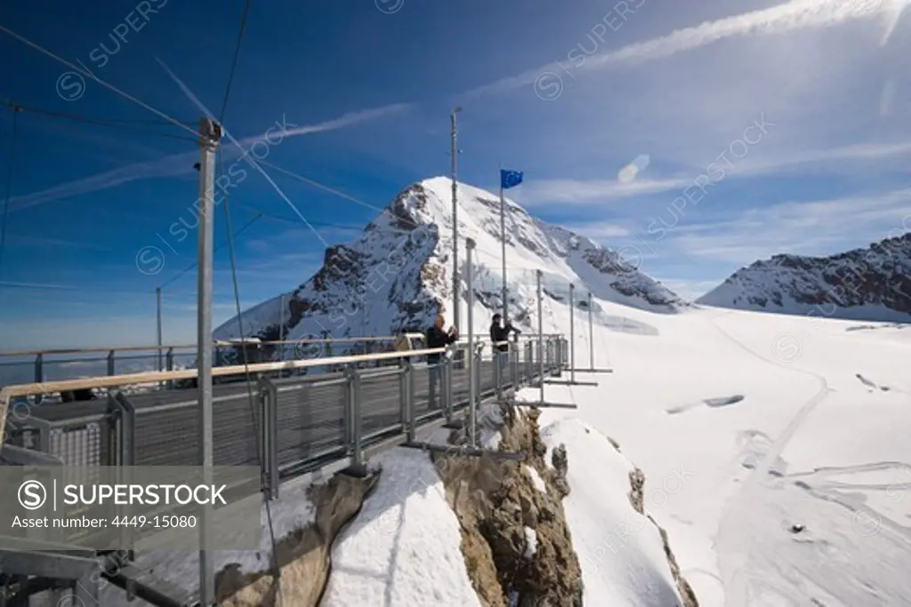 People at viewing platform of Sphinx Observatory (3571 m) at mountain Sphinx near Jungfraujoch (3454 m), also called the Top of Europe (highest railway station in Europe), Grindelwald, Bernese Oberland (highlands), Canton of Bern, Switzerland