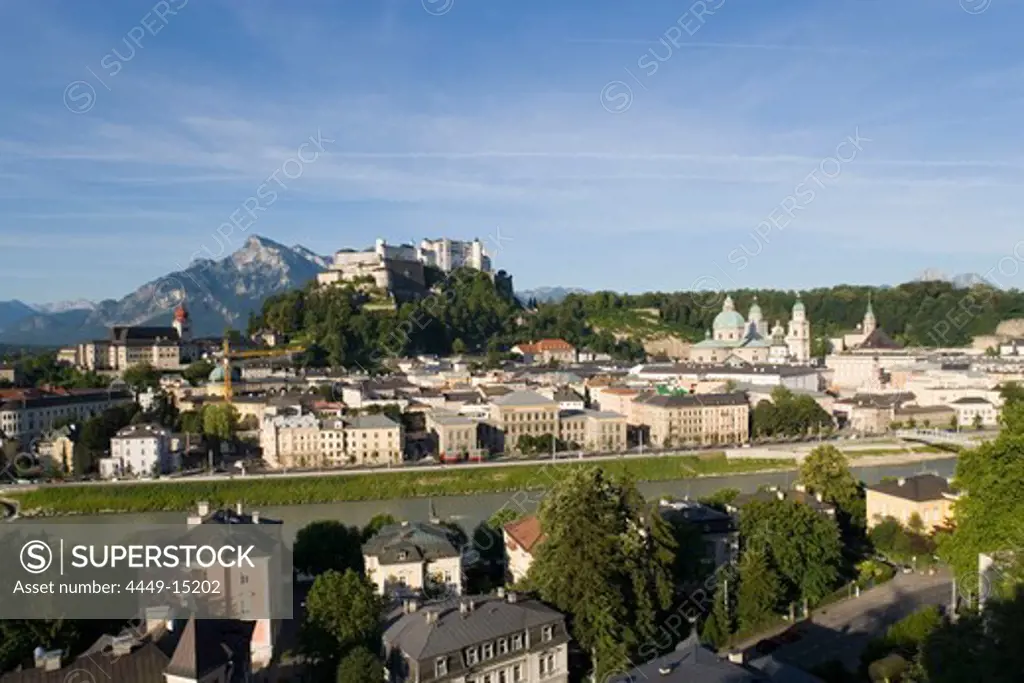 View over Salzach to Old Town with Hohensalzburg Fortress, largest, fully-preserved fortress in central Europe, Salzburg Cathedral, Franciscan Church and Collegiate Church, built by Johann Bernhard Fischer von Erlach, European Alps in background, Salzburg, Salzburg, Austria, Since 1996 historic centre of the city part of the UNESCO World Heritage Site