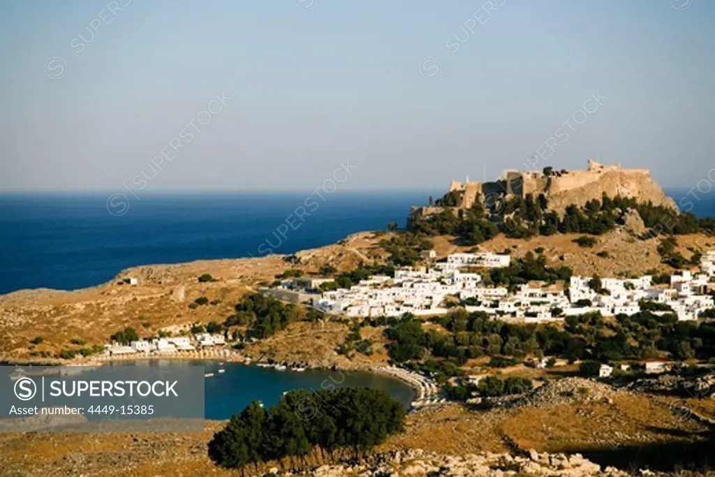 Elevated view of Lindos Bay and town with Acropolis, Lindos, Rhodes, Greece